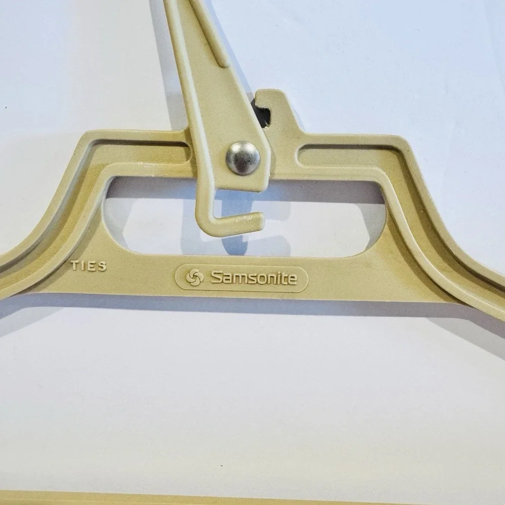 (4) Vintage Clothes Hangers, 1 Samsonite, 2 Satin Covered, 1 Wooden Clamp Hanger